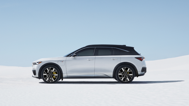 Extreme wide side view of white ZDX parked on salt flat.